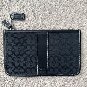 Coach Black Pouch signature fabric leather trims.